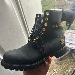 Champion Black Boots with Gold Details